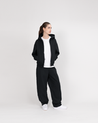 SU ZIP JOGGER - SCHWARZ