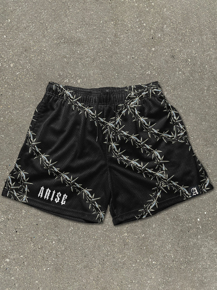Pantaloncini in mesh con stampa di spine divertenti