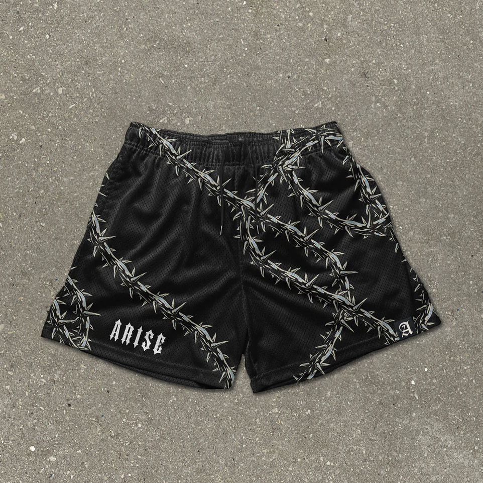 Pantaloncini in mesh con stampa di spine divertenti