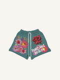 Shorts mit Blumen- und Buchstabenmuster und Kordelzug in der Taille