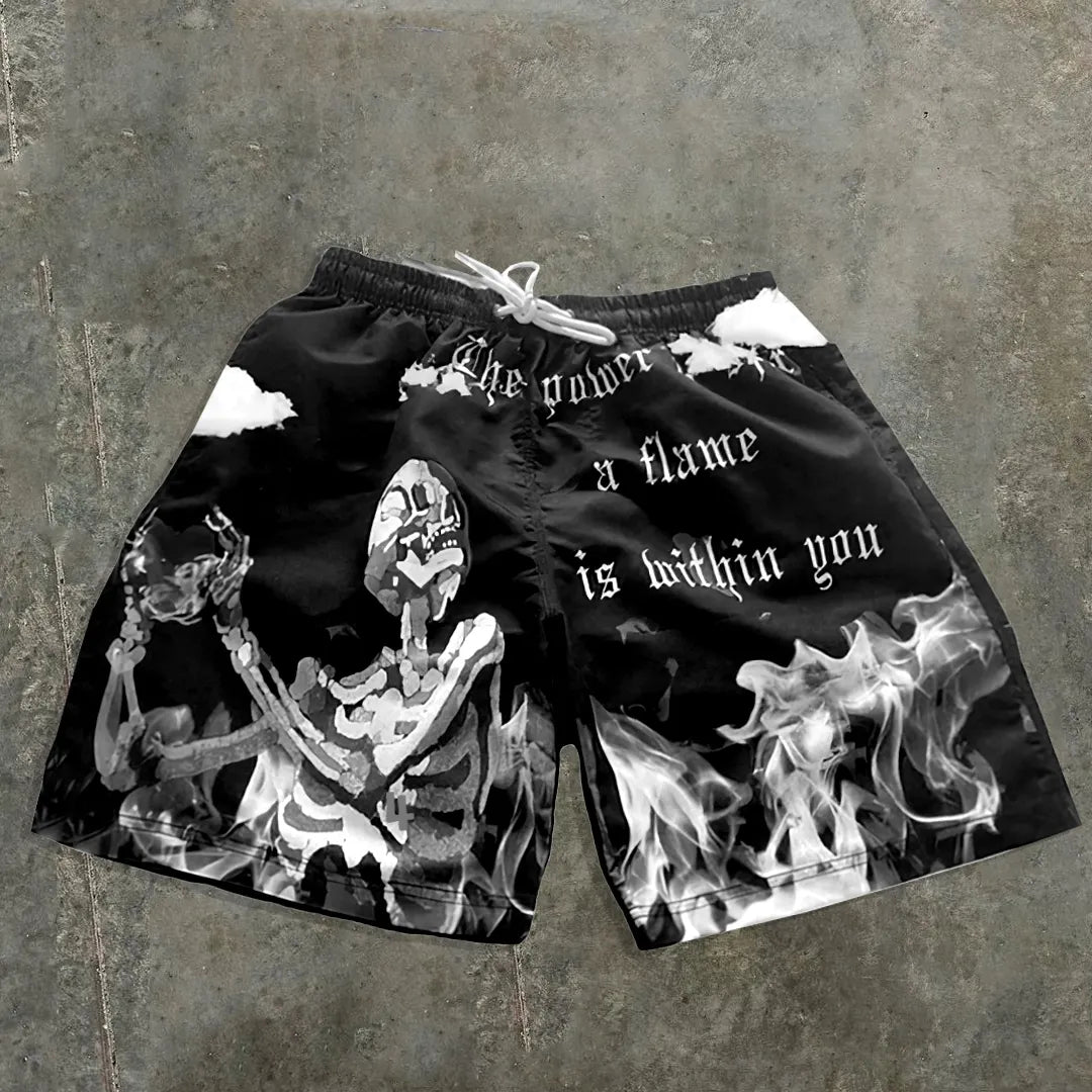 Casual mesh shorts in streetwearstijl met schedelopdruk en de tekst The Power To Spark A Flame Is Within You