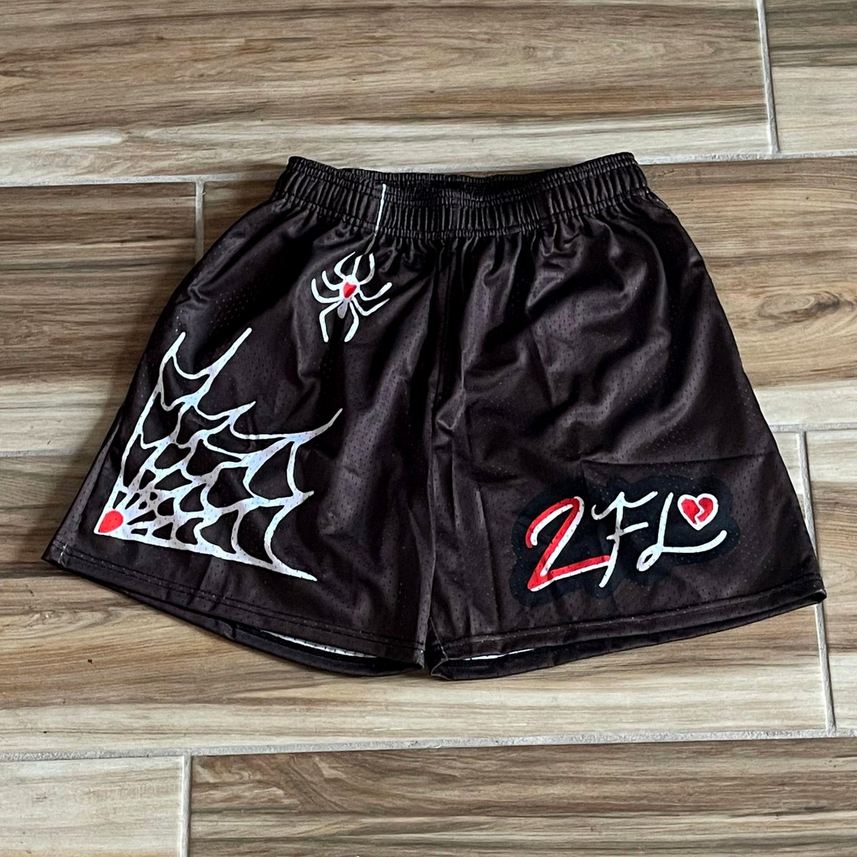Casual meshshort met vrolijke spinnenprint