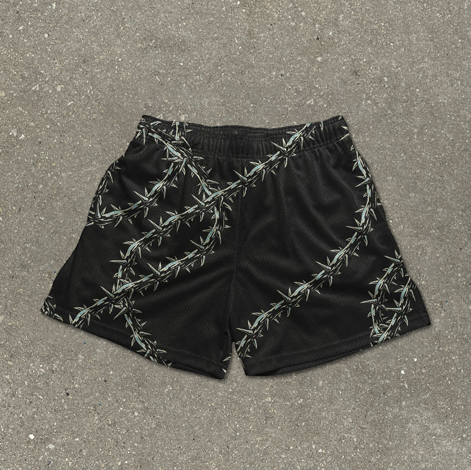 Pantaloncini in mesh con stampa di spine divertenti