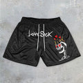 Shorts en maille à imprimé tête de mort Love Sick