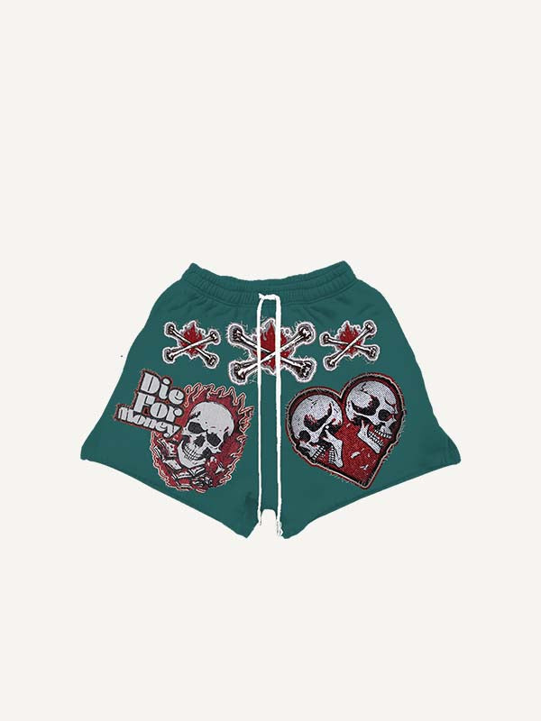 Shorts met schedel-, vuur-, letter- en hart-nepstickerprint en trekkoord in de taille