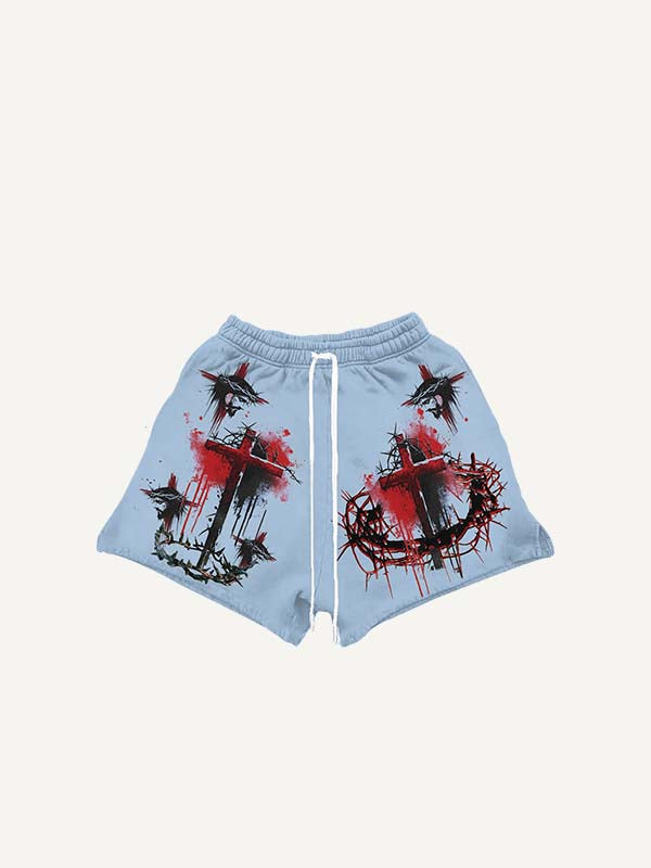 Pantaloncini con coulisse in vita e stampa di croce e grafica