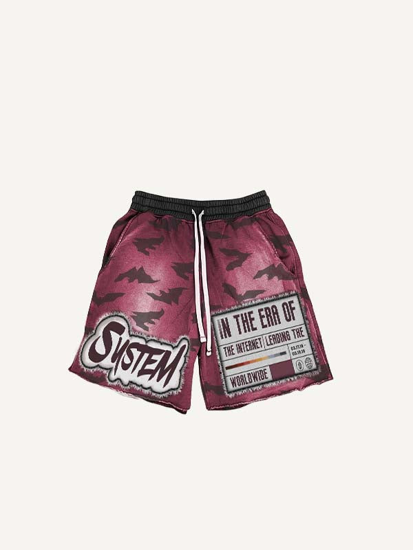 Short met trekkoord in de taille en een imitatie-decalprint met letters en grafische afbeelding