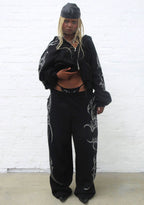 PANTALON DE JOGGING OVERSIZE À STRASS CRASH NOIR