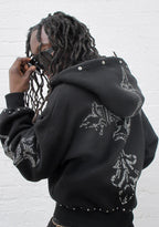 FERAL KUNSTFELL-HOODIE MIT NIETEN UND REISSVERSCHLUSS SCHWARZ (ABNEHMBARES FELL)
