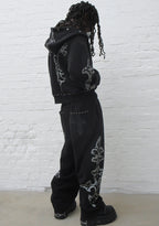 PANTALON DE JOGGING OVERSIZE À CLOUS FERAL NOIR