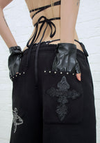 PANTALON DE JOGGING OVERSIZE À CLOUS FERAL NOIR