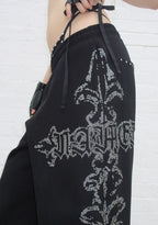PANTALON DE JOGGING OVERSIZE À CLOUS FERAL NOIR