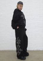 PANTALON DE JOGGING OVERSIZE À CLOUS FERAL NOIR