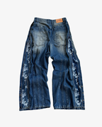 JEANS CON CREMALLERA FLORAL AZUL LAVADO