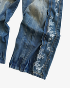 JEANS CON CREMALLERA FLORAL AZUL LAVADO