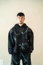 Sweat-shirt entièrement orné de strass noirs