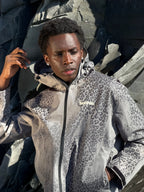 Chaqueta impermeable de guepardo reactiva al agua - Gris