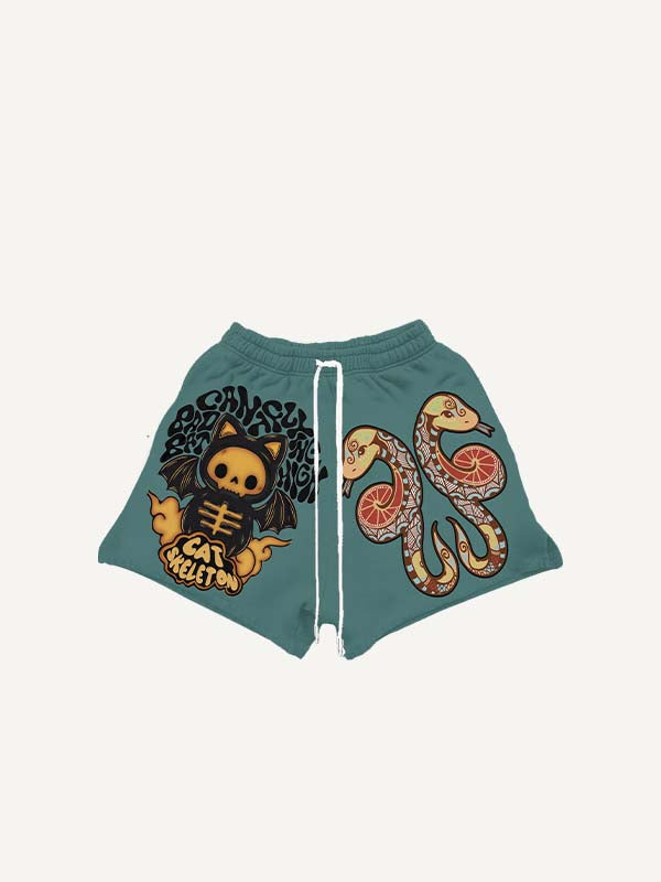 Shorts à taille élastique avec cordon de serrage et imprimés petit diable, aile, nuage et serpent