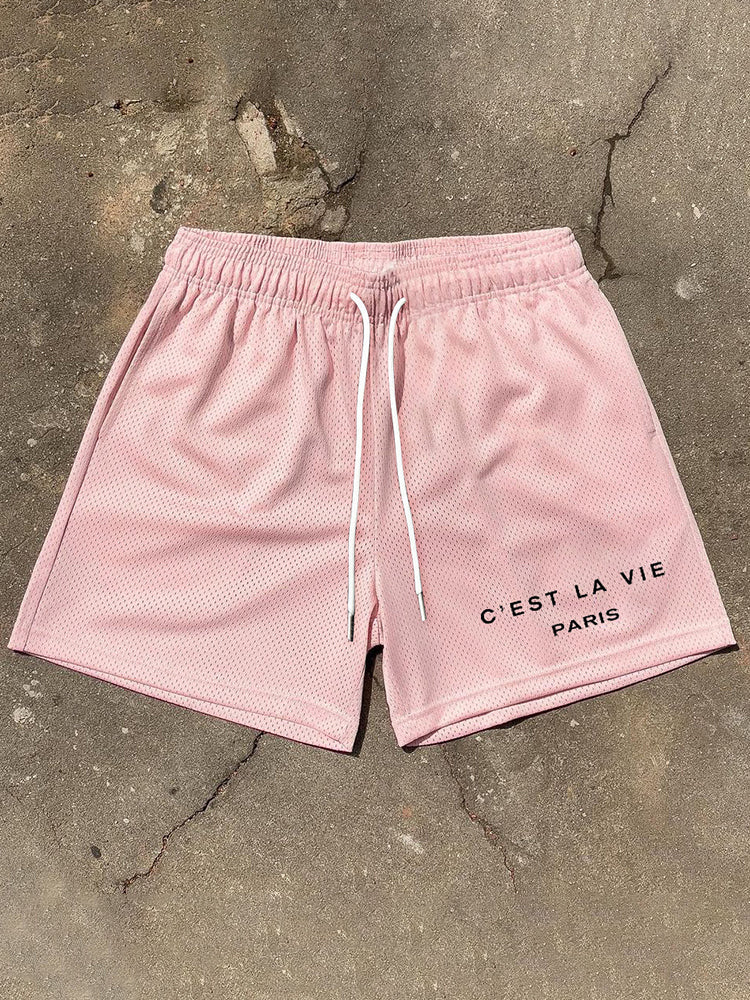 Meshshort met 'C'est La Vie'-grafiek