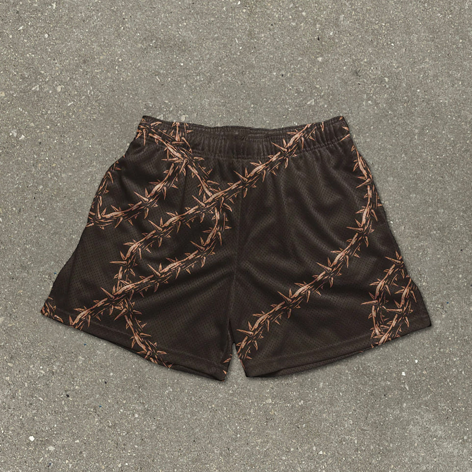 Pantaloncini in mesh con stampa di spine divertenti