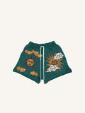 Shorts à taille cordon avec imprimé soleil, œil et nuage tristes