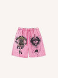 Shorts mit Distressed-Optik, Eye&Moon-Grafikprint und Kordelzug in der Taille