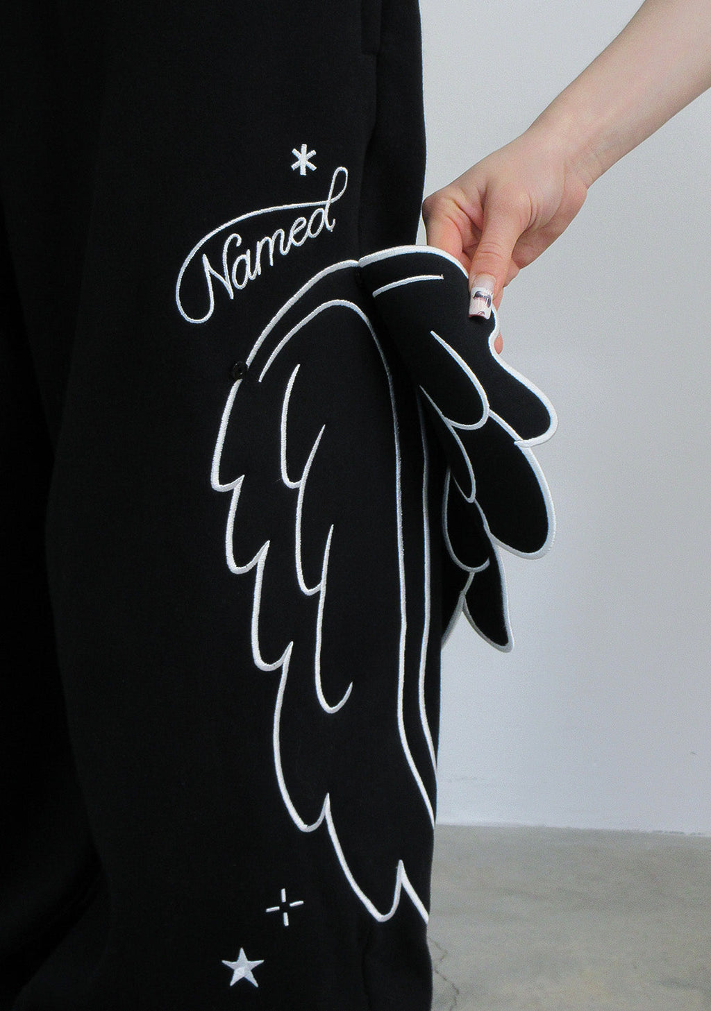 PANTALON DE JOGGING SURDIMENSIONNÉ STITCH WINGS NOIR (AILES AMOVIBLES)