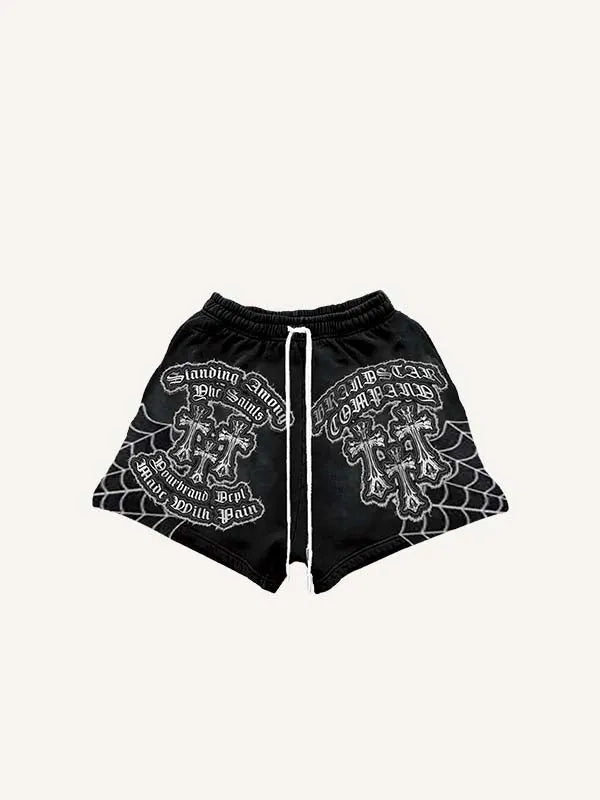 Short met print van spinnenweb, kruis, letters en grafische elementen met imitatie-opdruk en trekkoord in de taille