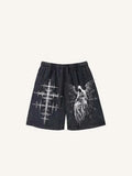 Shorts à taille élastique avec cordon de serrage, imprimé graphique croix, ailes et silhouette vieillie