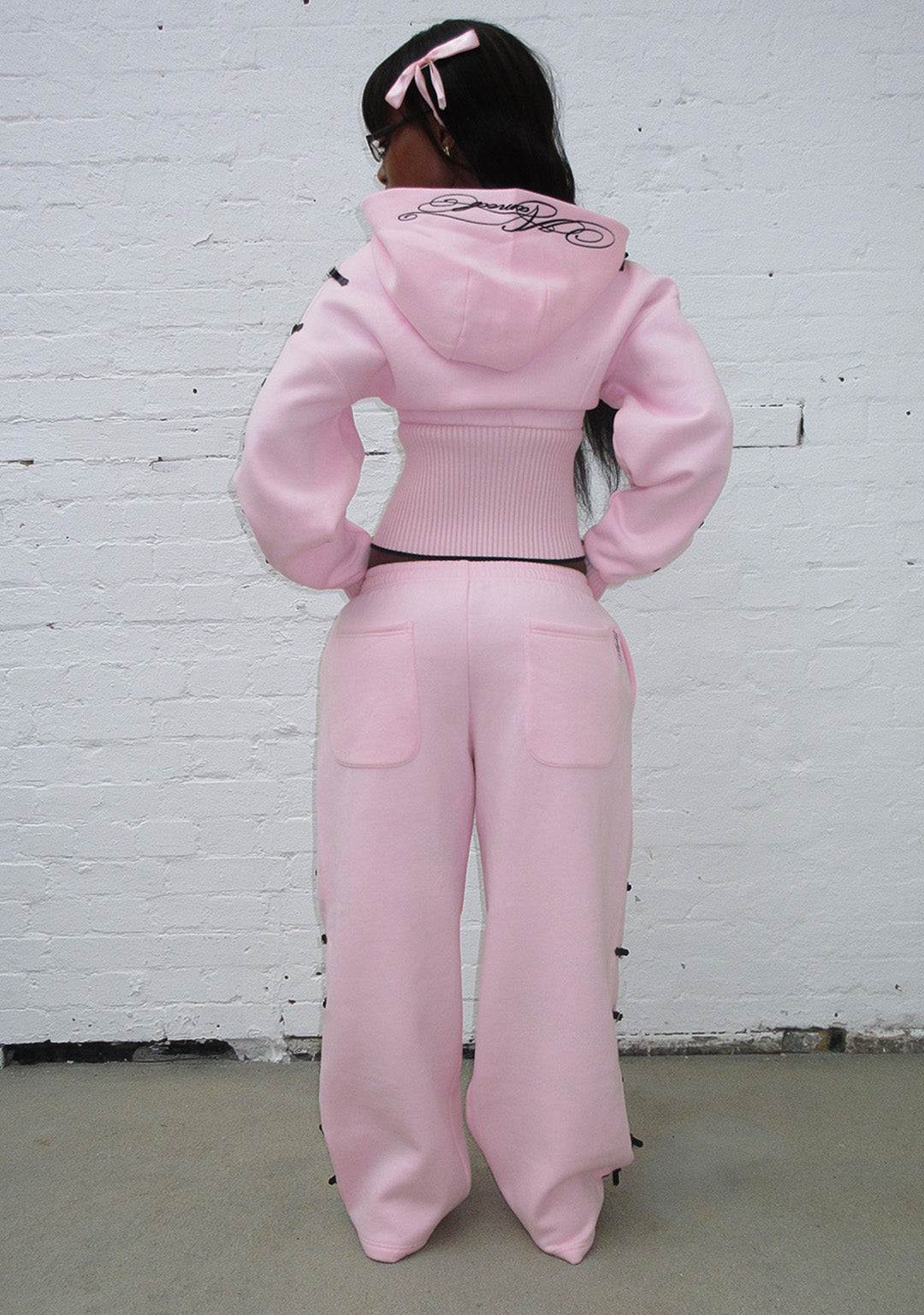 Pantaloni della tuta oversize con fibbia CRUSH rosa baby