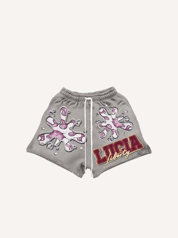 Shorts à cordon de serrage avec motif graphique et lettres imprimées effet décalcomanie