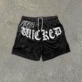 Shorts en maille à imprimé graphique lettré Spider
