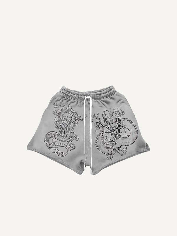 Pantaloncini con coulisse in vita e stampa drago e grafica