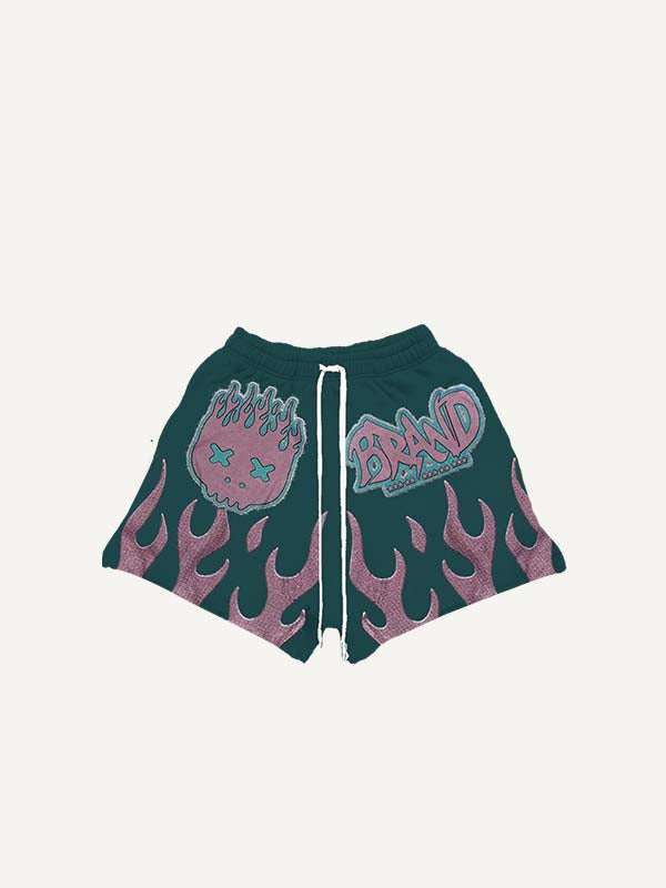 Shorts à taille cordon avec imprimé décalcomanie effet feu et graphique