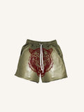 Shorts mit Tiger- und Buchstabenprint und Tunnelzug an der Taille