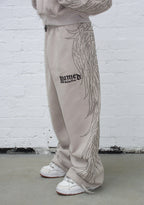 FALLEN STUDDED OVERSIZED SWEATPANTS BONE