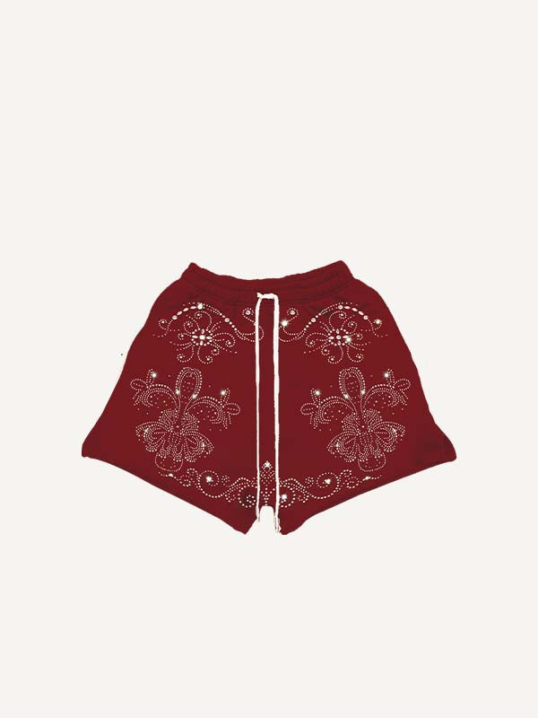 Shorts mit Grafik- und Buchstaben-Print in Strass-Optik und Kordelzug am Bund