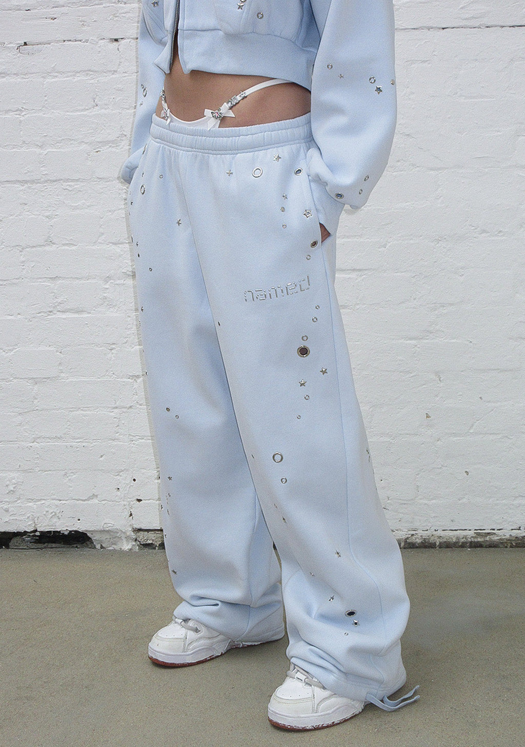 PANTALON DE JOGGING OVERSIZE À ŒILLETS GLITCH BLEU BÉBÉ