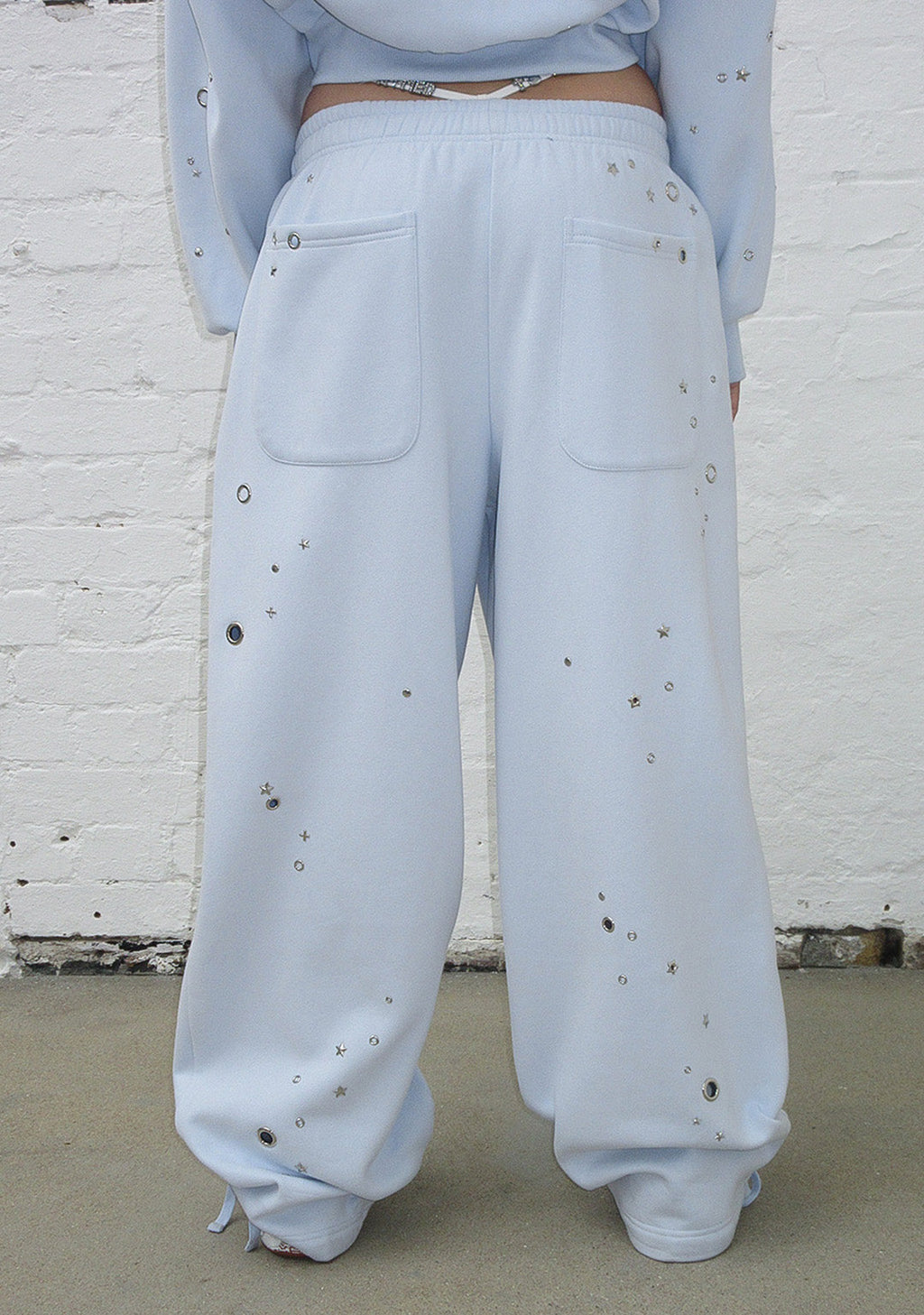 PANTALON DE JOGGING OVERSIZE À ŒILLETS GLITCH BLEU BÉBÉ