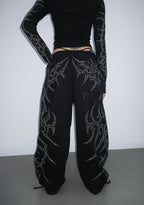 HAUNT PANTALONES DEPORTIVOS OVERSIZE CON TACHUELAS NEGROS