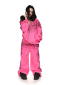 Pantaloni della tuta oversize con strass INFATUATION rosa acceso