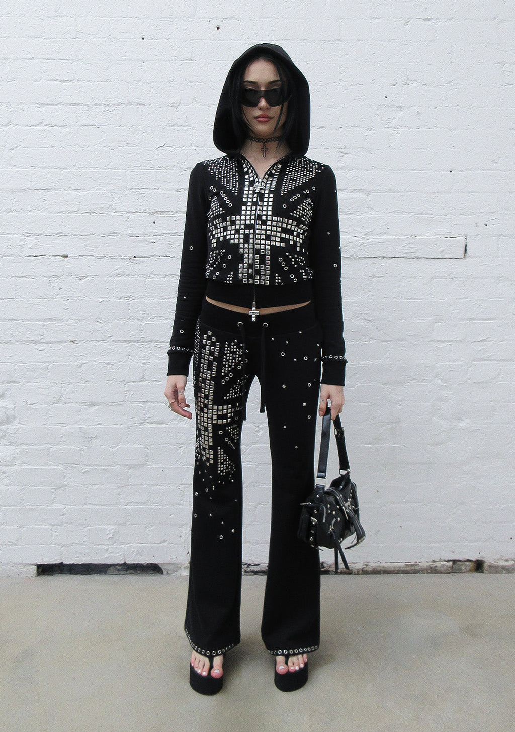 Pantaloni aderenti con borchie KNIGHT, neri