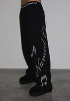 MUSE STUDDED OVERSIZED SWEATPANTS BLACK