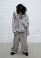 PANTALON DE JOGGING OVERSIZE À STRASS OMEN GRIS FUMÉ