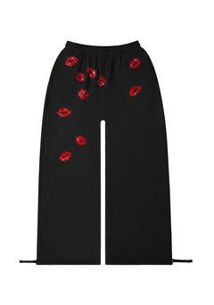 TEASE PANTALONES DEPORTIVOS OVERSIZE CON BESOS DE STRASS NEGROS