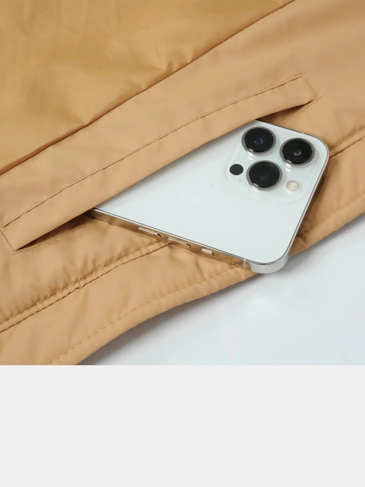 Manteau long matelassé à losanges avec ceinture
