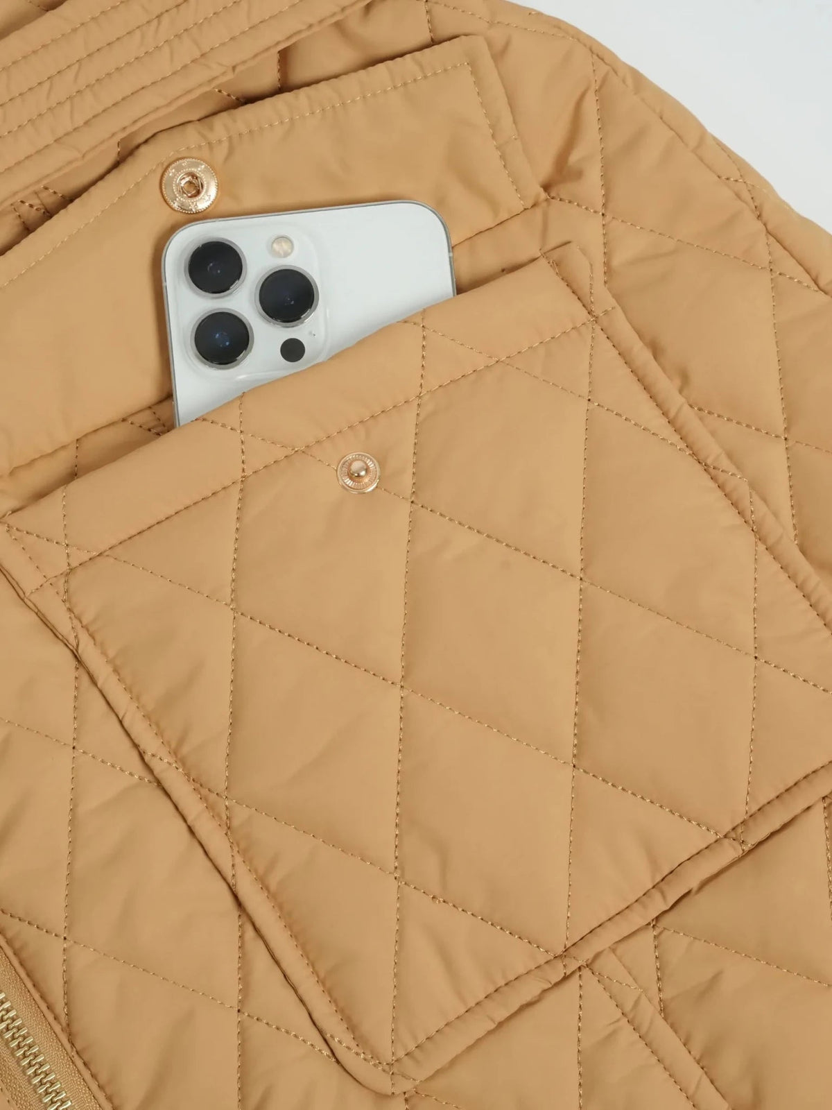 Manteau long matelassé à losanges avec ceinture